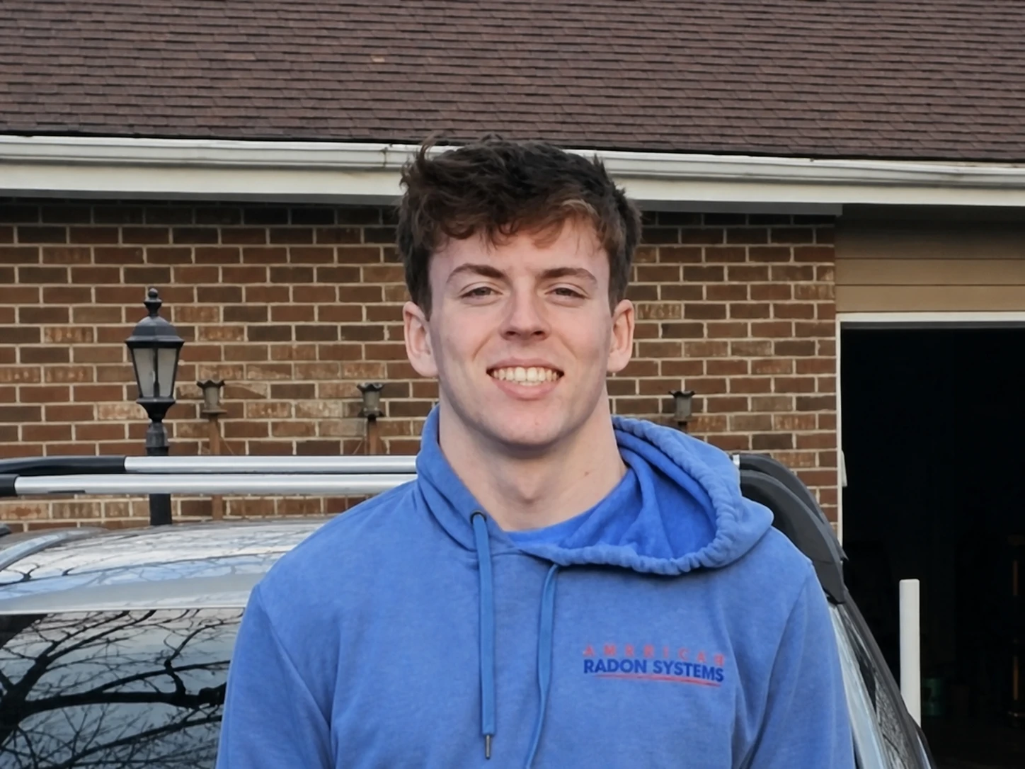 Tyler from the American Radon Systems family and field crew.